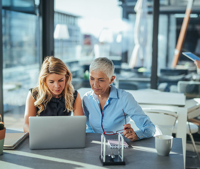 Two businesswoman having a meeting in the office